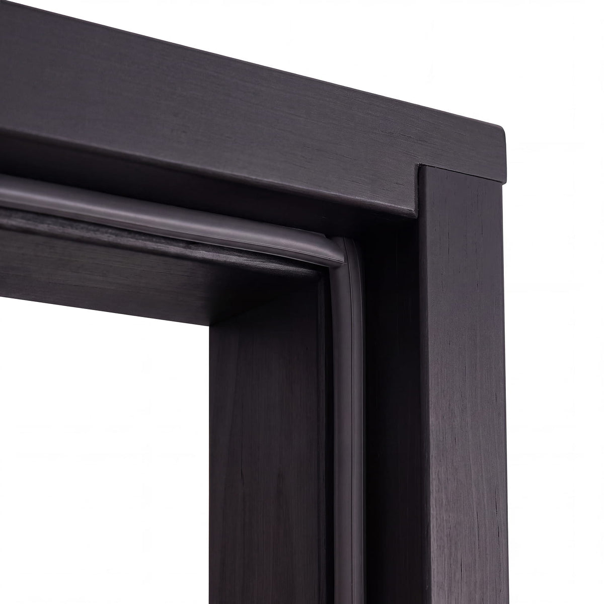 Close-up of the black alder frame and door seal on the Portti black sauna door