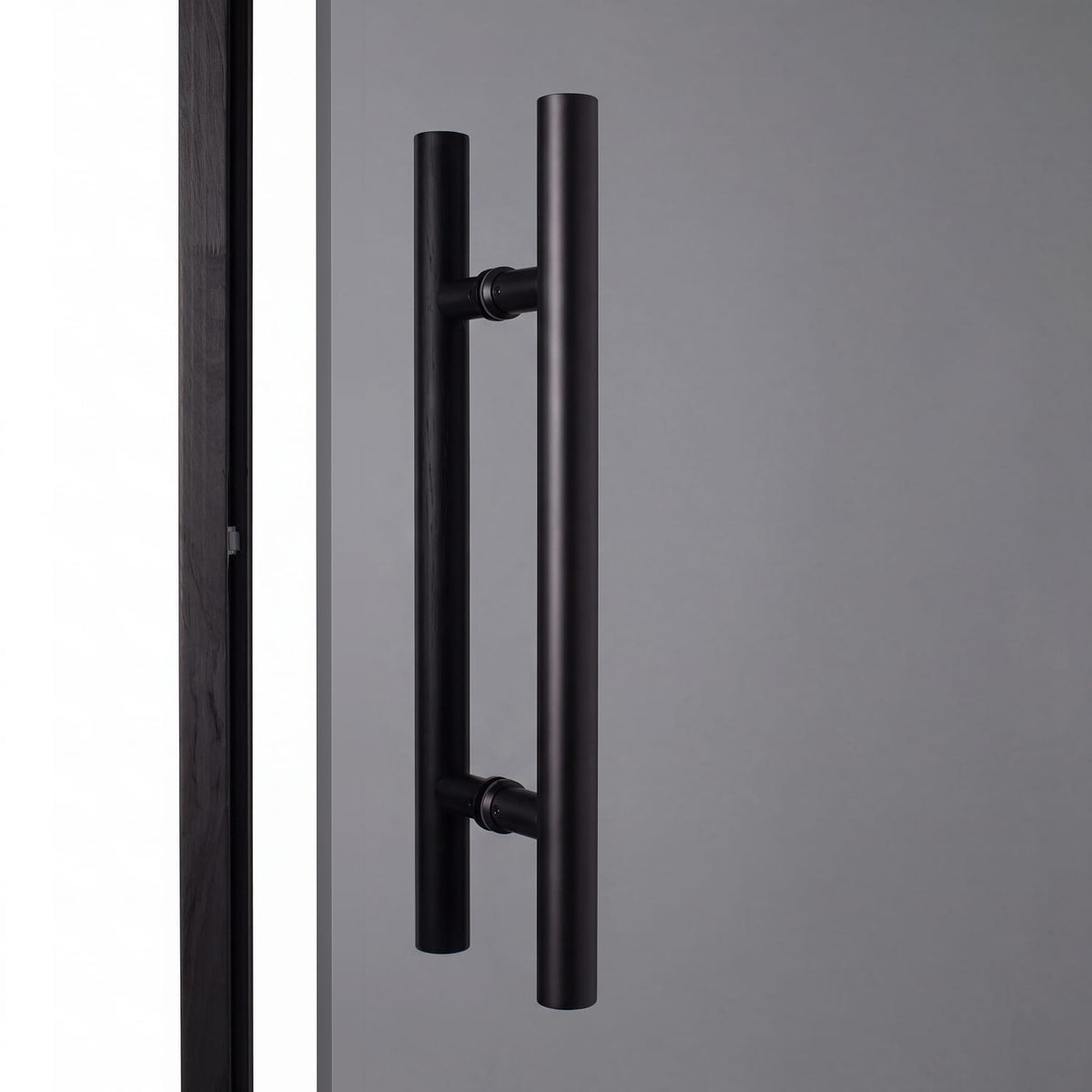Black round bar sauna door handle, 20 in, on the Portti black glass sauna door