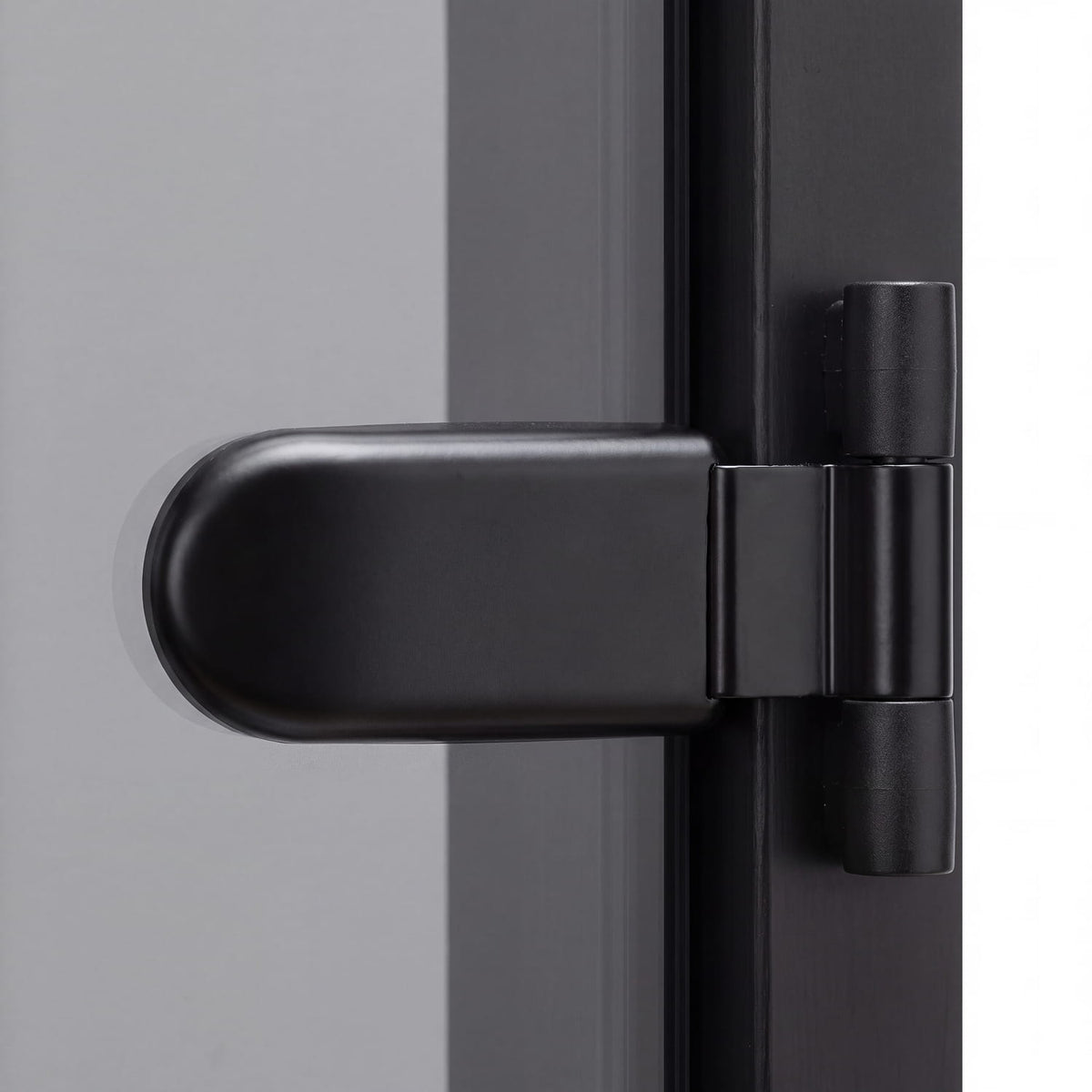 Black sauna door hinge on grey tempered glass and black alder frame