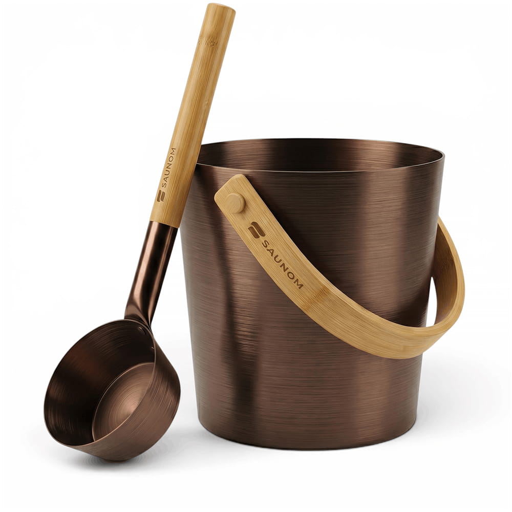 Brown anodized aluminum sauna bucket and bamboo-handled ladle studio shot