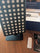 SAUNOM red light therapy panel with tabletop stand, remote control and accessories