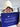 Man wearing a white wool sauna hat while holding SAUNOM product packaging