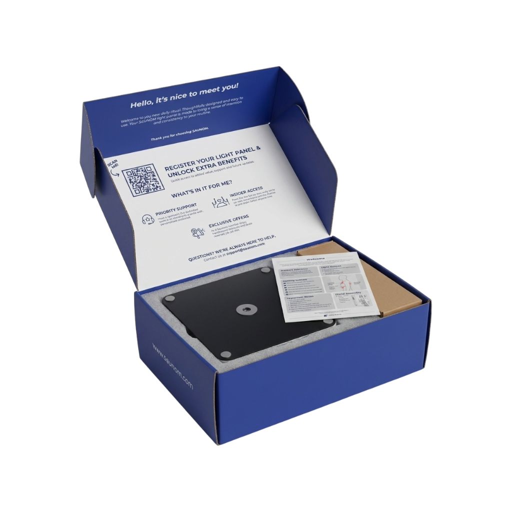 SAUNOM red light therapy panel packaging with tabletop stand, user guide and accessories